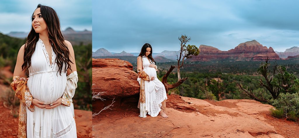 Pregnant woman in a white dress sitting on a red rock in Arizona for her maternity photo shoot.