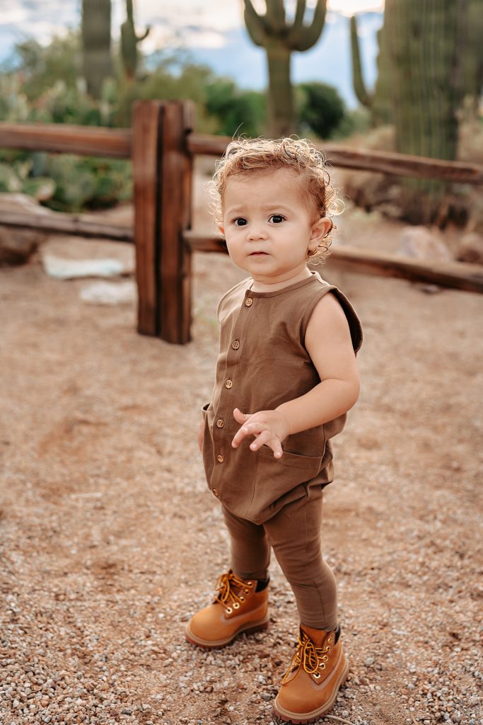 Toddler in brown jumpsuit 